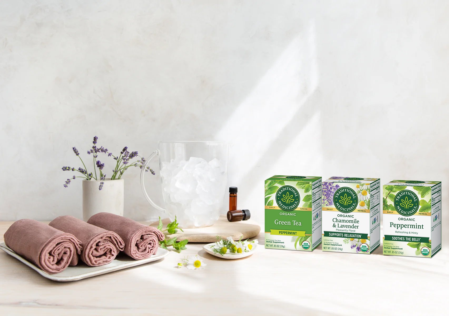 Towels and Tea boxes on table